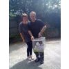 Pookey -on his way home with his Mum and Dad.