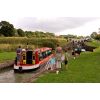 Going through the Caen Hill lock system with spectators