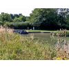 Looking across tone of the many  Pound lake on the Kennet and Avon canal Devizes
