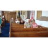 Early comers to Sunday Service