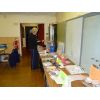 Eileen checking out the for sale goods