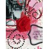a close up of Maggie's beautiful ribbon rose embellishment