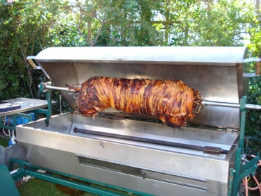 Hog Roast Machine with fresh pig 