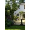 A b & b with a charming ambience. Guests enjoy views across pretty courtyard and gardens during their stay