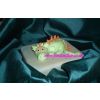 Fondant green baby dragon on cake