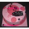 Pink birthday cake decorated with shoes and handbag