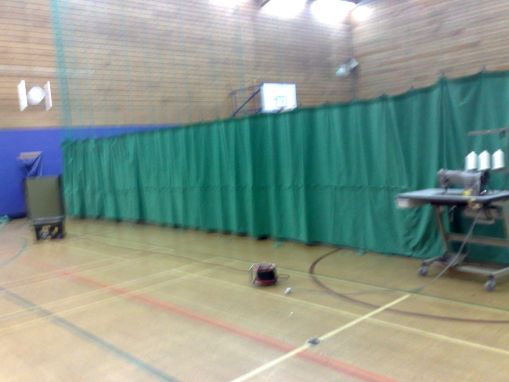 Repair and replacement of arena and sports hall curtains