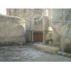 This is a door way in the Old City in Baku.....step beyond it to see where it leads.   The author lived very near to here.