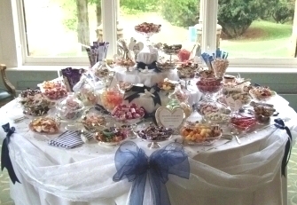 Choose your 30+ varieties for us to present on your sweets buffet table in vintage silver and crystal dishes and bon bon jars with silver spoons and tongs, hearts and doves and lots of sparkle. This is a 5' diameter table.