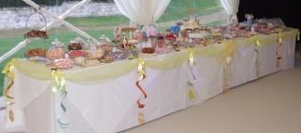 Easter wedding sweets table for 300 guests on an 18' long table with 40 varieties