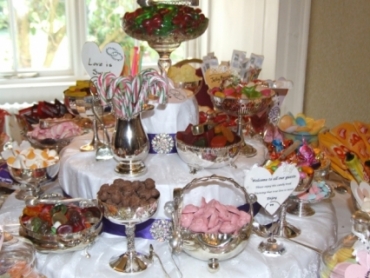 Silver and crystal, hearts, diamantes, silver tongs and spoons make your wedding sweets table extra special