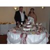Tina and Mark see what's left of their Wedding Candy Sweet Buffet table after giving guests 1st choice of the pick and mix banquet at the Charlecote Pheasant Hotel.