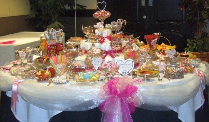 35 varieties vintage glamour wedding sweets buffet presented in real silver and crystal dishes and bon bon jars.