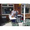 Alistair Hamilton selling Parkgate ice cream, and Dave Hay cooking on the Barbecue.