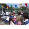 Part of the crowd enjoying the sun, ice cream and barbecue.