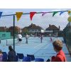 Cheshire LTA President, Barbara Bloor, watches the Junior coaching sessions.