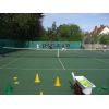 Mike gets out the automatic ball feeder as coaching on three courts seems to be taking its toll.