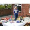 Helen running the Tombola Stall