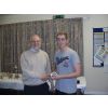 Alan Fryer presents the Under 18 Boys Runner-up trophy to Joel Thompson