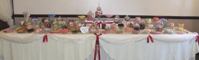 A 12' wedding sweets buffet table for 150 with 25 varieties at Holthorpe Hall