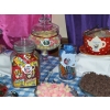Part of the 30' sweets buffet for the Keble college ball, Oxford University, for 1400 guests. Mad Hatter's tea party theme.
