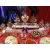 Candy buffet 2-tier centrepiece on a 12' long table decorated in your colours.