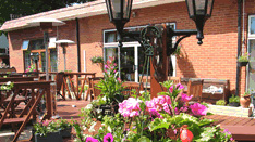 Enjoy Lunch or Dinner on our outdoor decked terrace Enjoy Lunch or Dinner on our outdoor decked terrace