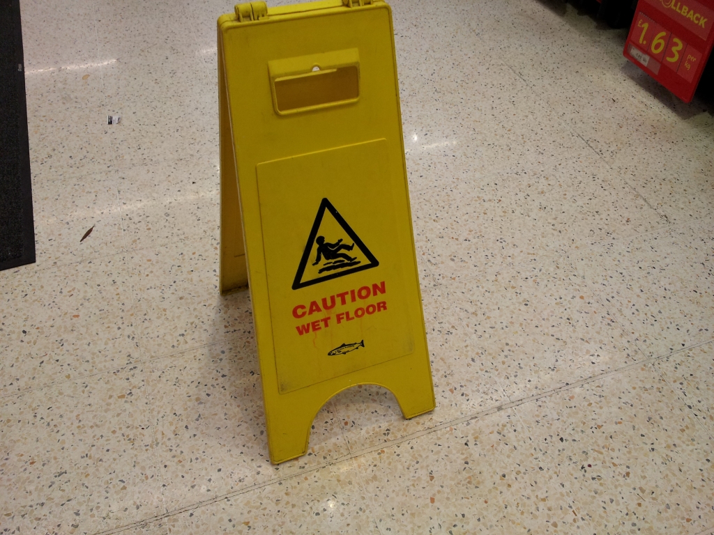 Wet floor hazard warning sign