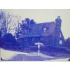 Dove Cottage (where the bottom of Ewell Lane intersects Lower Road) probably between 1900 and 1914, covered in ivy.