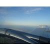 A twin engine prop aircraft to Redding. Mount Shasta in the distance
