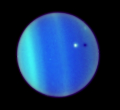 Uranus with moon Ariel, taken from Hubble