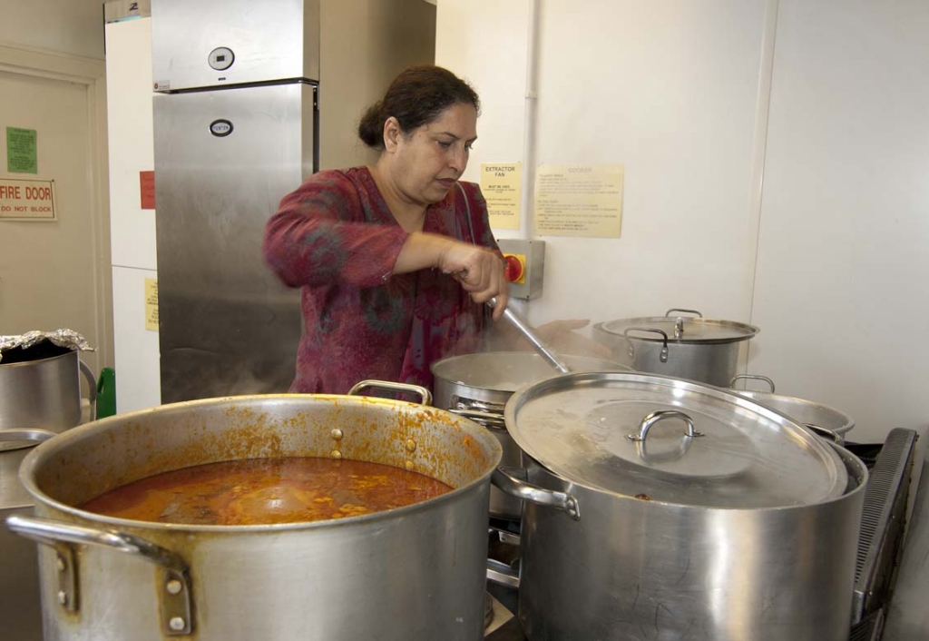 Preparing food at Northampton's Manna Langar, held at the Open Door Centre, Kettering Road.