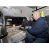 Chris Mounteney, Operations Director of UK Homes 4 Heroes, providing food and hot drinks to 2 homeless people in Northampton.
