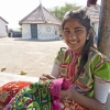 Girl doing needlework in village near Bhuj, Gujarat, India.