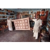 Elderly and younger man, who sell shoes and carpets, in village near Bhuj, Gujarat, India.