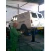 John May working on the rear brakes where an adjuster seized.