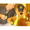 Bending Ted's ear.  Needs more than a diet Coke sometimes. It's OK, he is used to it. When the Boss buys the beer, what can a van boy do?
