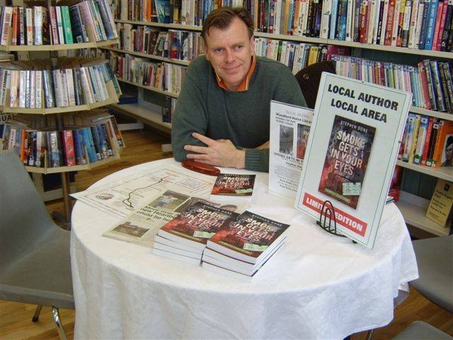  Signing books at Woodfrod Halse Library