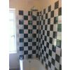 Tiling and shower installation.