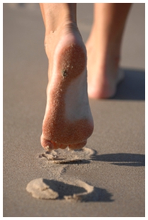  feet walking across sand