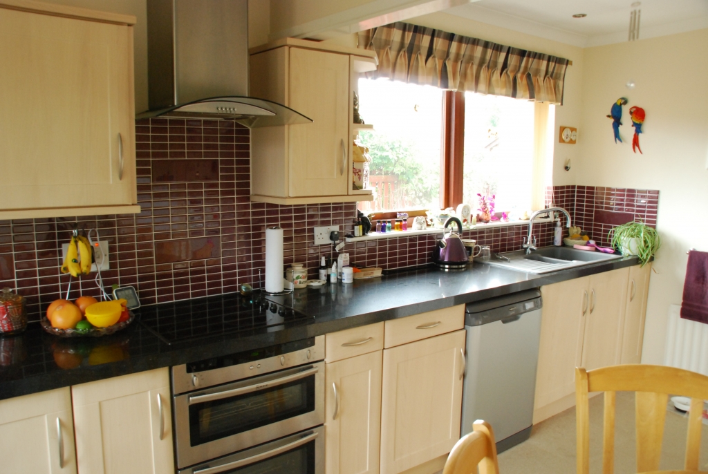 The diner area has a cluster ceiling light and the main work area has