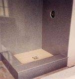  Custom shower tray with coal granite panels