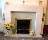 mint granite hearth & back panel with textured granite surround