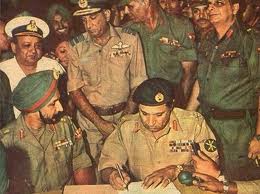 Pakistani General signing surrenders papers