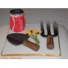 Coca-Cola Can and gardening tools