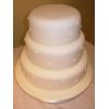 Plain iced cake with beading