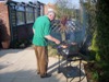 Alan barbecuing in our back garden