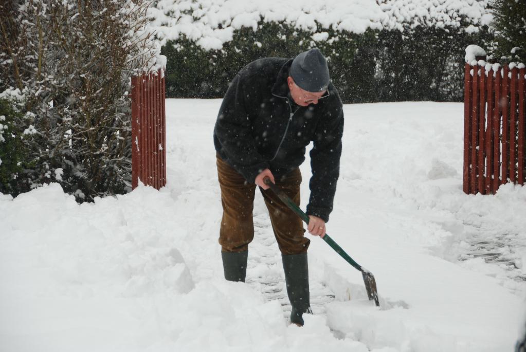 Alan clearing snow from our driveway