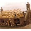 Geordie Duthie, joiner putting on a new roof at 114 High Street New Pitsligo
