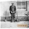 Robbie Wisely holding a peat spad (spade)